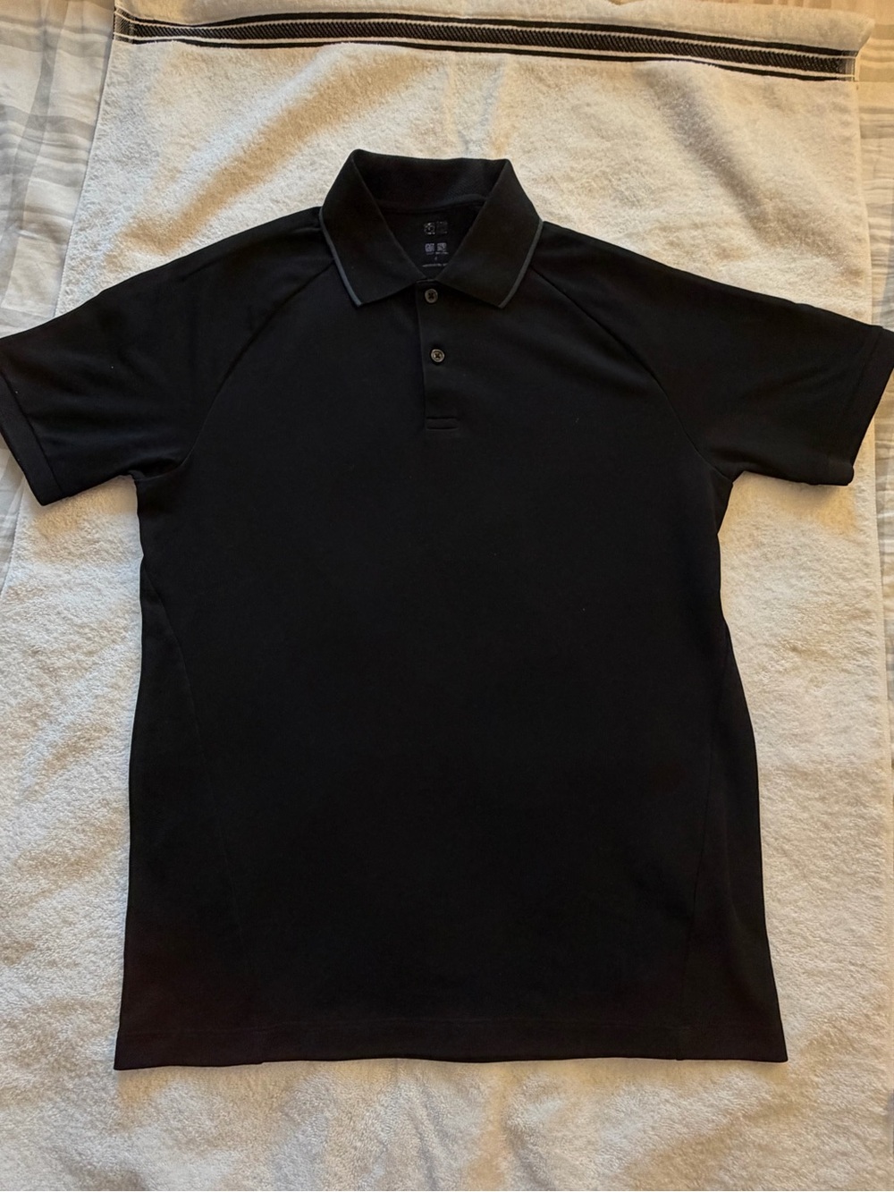 Uniqlo Black Polo Shirt with Subtle Collar Trim